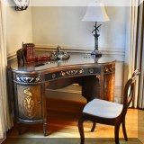 F19. Kidney shaped marquetry desk. 32&rdquo;h x 48&rdquo;w x 23&rdquo;d  